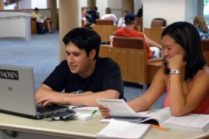 Two students studying in library