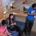 PHOTO: Students on mobile devices in Pugh Hall.