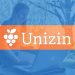 GRAPHIC: Unizin logo layered on female student studying outside