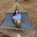 PHOTO: Female student in hammock, taken at University of Florida residence halls