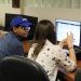 PHOTO: ETD staff member helping graduate student at the UF Computing Help Desk