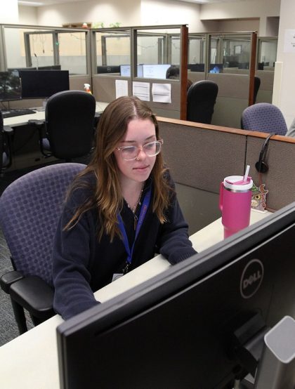 PHOTO: Student employee working at the UFIT Help Desk. University of Florida.